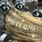 The 3 Raccoon’s Welcome Statue