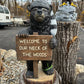 Standing Bear with “Welcome to Our Neck of the Woods”