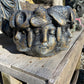 Pot with many Faces
