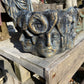 Pot with many Faces