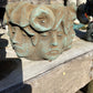 Pot with many Faces